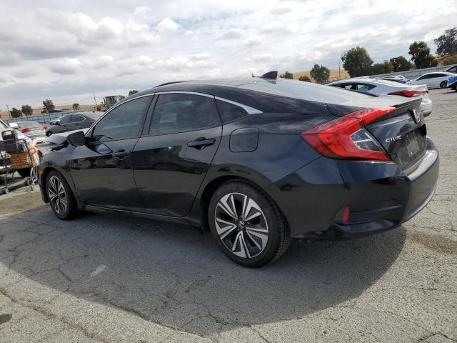 Photo 2 from auction – 2018 HONDA CIVIC EX with VIN JHMFC1F33JX037687
