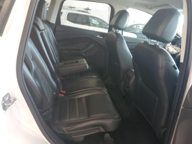 Photo 11 from auction – 2017 FORD ESCAPE TIT with VIN 1FMCU9J95HUD83789