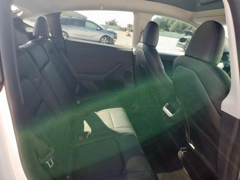 Photo 10 from auction – 2022 TESLA MODEL Y with VIN 7SAYGDEE6NA011927