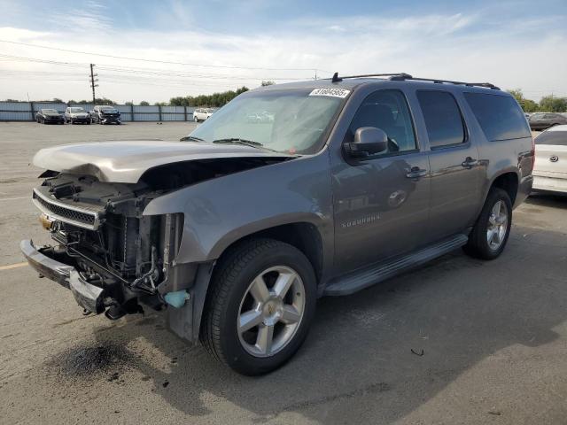 CHEVROLET SUBURBAN K 2011 with VIN 1GNSKHE34BR265840 - Photo from auction