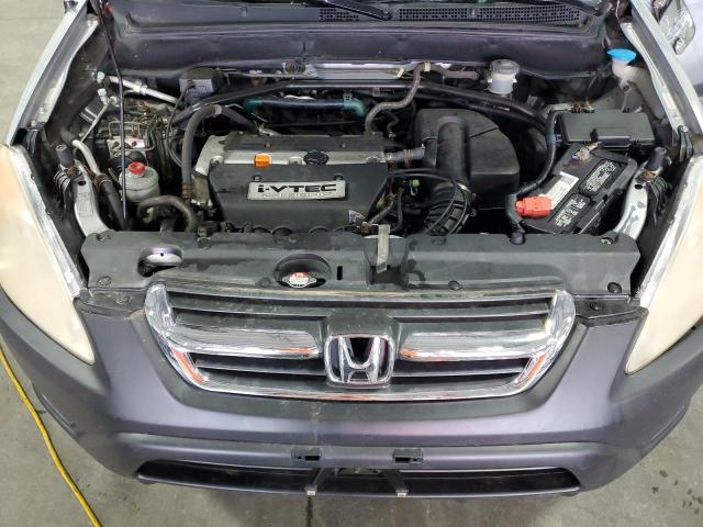 Photo 12 from auction – 2004 HONDA CR-V EX with VIN JHLRD78884C051056