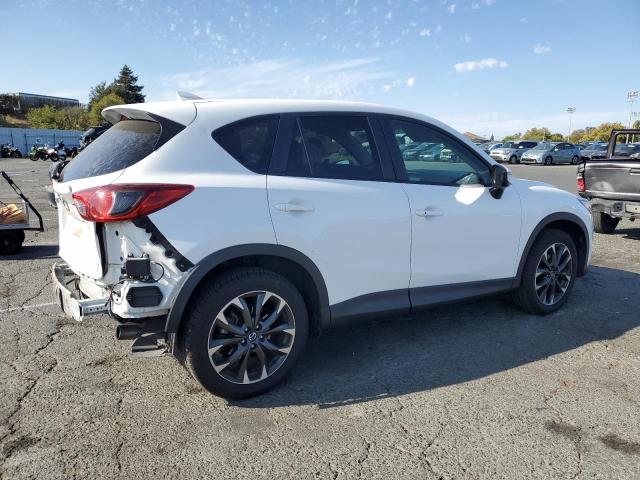 Photo 3 from auction – 2016 MAZDA CX-5 GT with VIN JM3KE2DY2G0885745