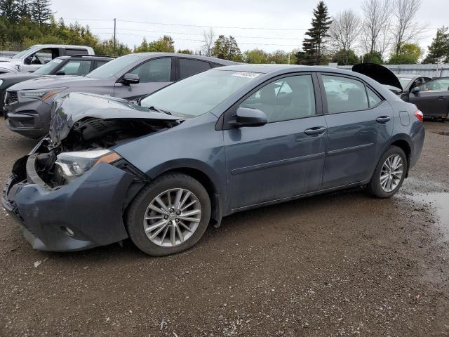 TOYOTA COROLLA L 2014 with VIN 2T1BURHE2EC046024 - Photo from auction