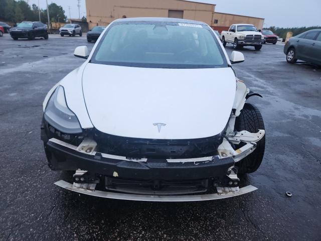 Photo 5 from auction – 2021 TESLA MODEL 3 with VIN 5YJ3E1EA2MF017749