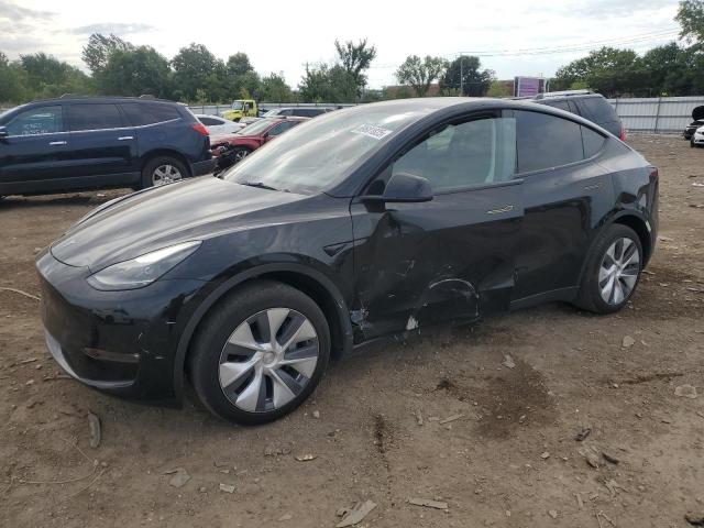 TESLA MODEL Y 2023 with VIN 7SAYGAEE7PF908534 - Photo from auction