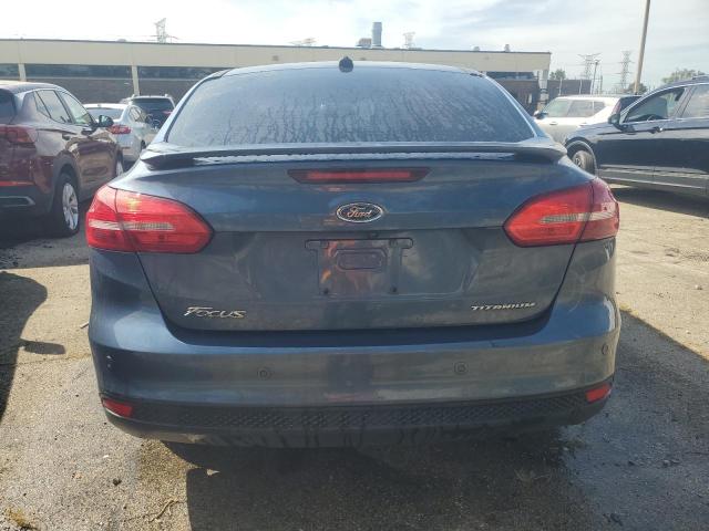 Photo 6 from auction – 2018 FORD FOCUS TITANIUM with VIN 1FADP3J21JL285554