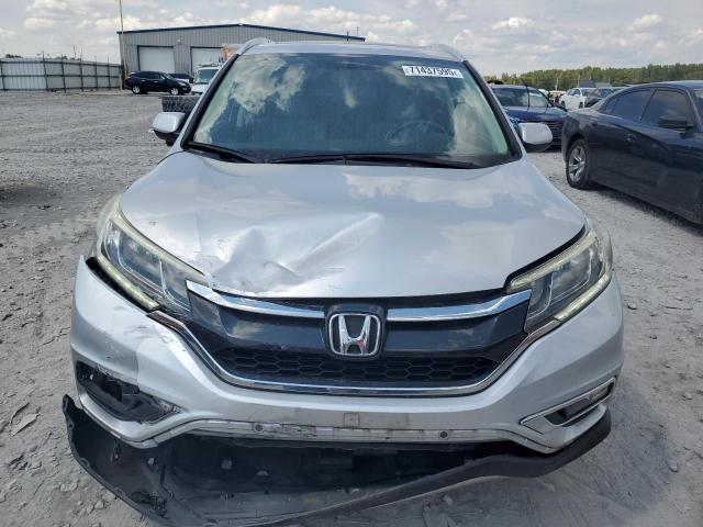 Photo 5 from auction – 2016 HONDA CR-V EXL with VIN 5J6RM4H72GL074110