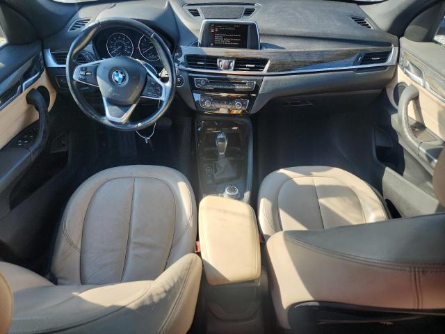Photo 8 from auction – 2016 BMW X1 with VIN WBXHT3Z38G4A48363