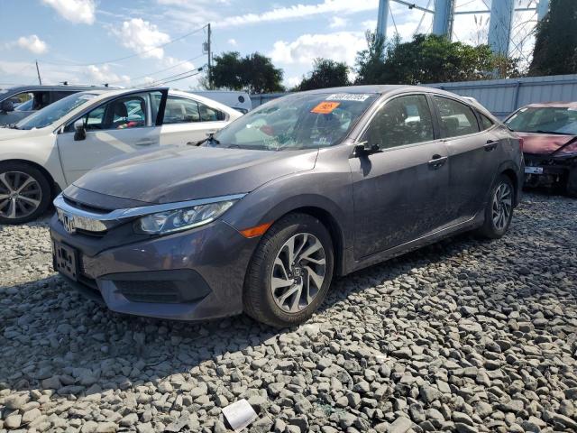 HONDA CIVIC EX 2017 with VIN 2HGFC2F75HH573695 - Photo from auction