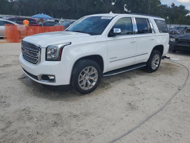 GMC YUKON SLE 2018 with VIN 1GKS1AKC8JR248954 - Photo from auction