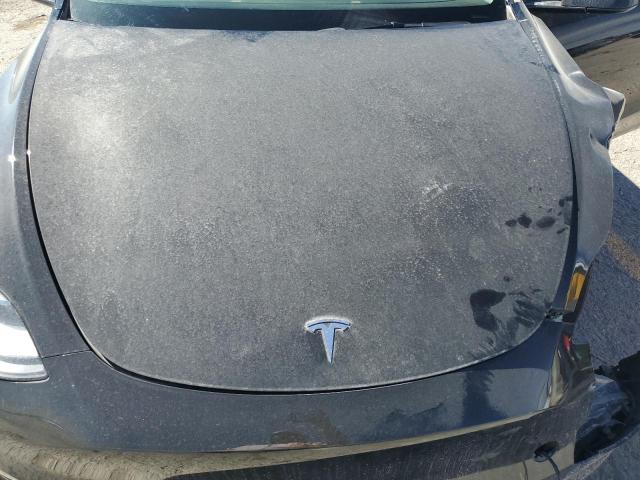 Photo 11 from auction – 2022 TESLA MODEL Y with VIN 7SAYGDEF7NF329762