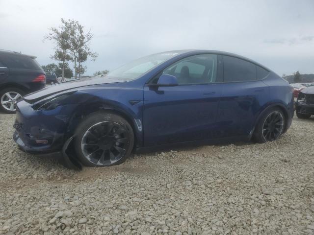TESLA MODEL Y 2023 with VIN 7SAYGAEE9PF914318 - Photo from auction
