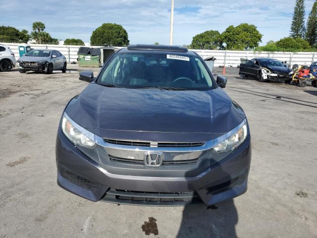 Photo 5 from auction – 2017 HONDA CIVIC EX with VIN 2HGFC2F71HH567392