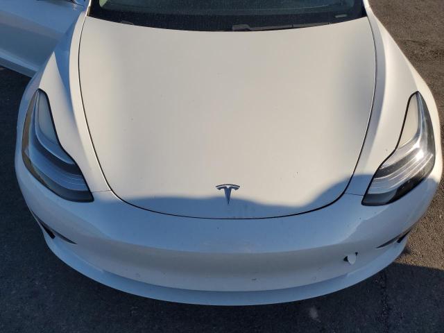 Photo 11 from auction – 2019 TESLA MODEL 3 with VIN 5YJ3E1EA6KF397109