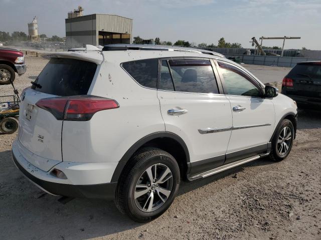 Photo 3 from auction – 2017 TOYOTA RAV4 XLE with VIN JTMRFREV0HJ135936