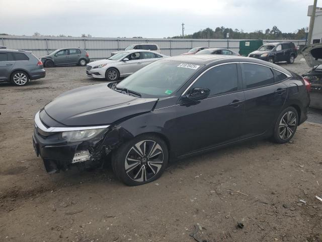 HONDA CIVIC EXL 2017 with VIN 19XFC1F77HE210545 - Photo from auction