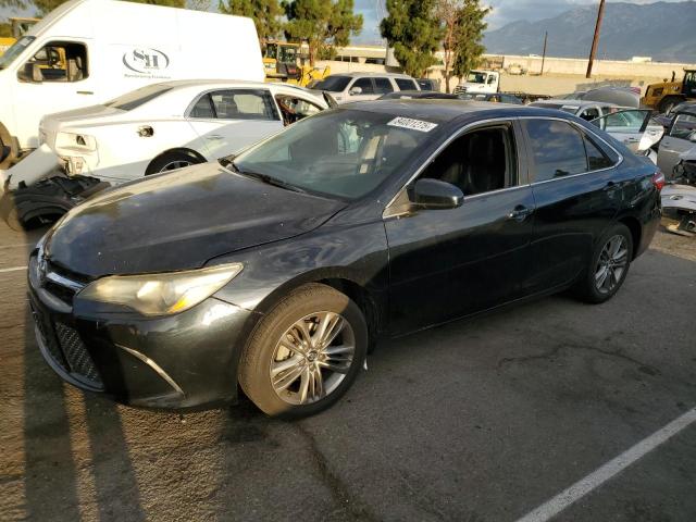TOYOTA CAMRY LE 2015 with VIN 4T1BF1FK2FU990765 - Photo from auction