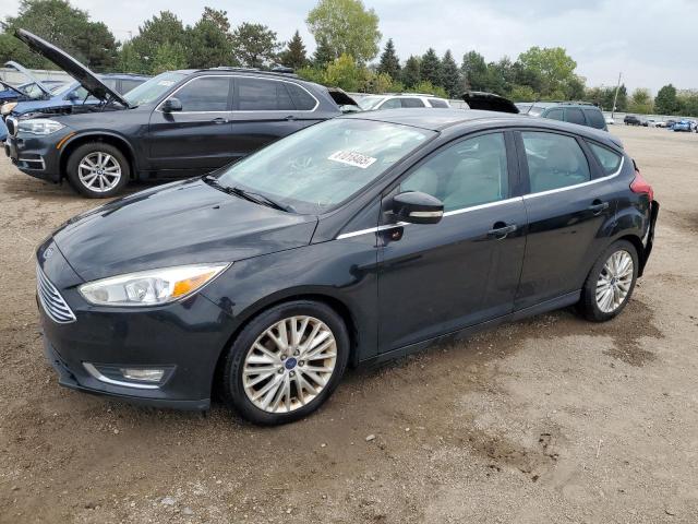 FORD FOCUS TITA 2016 with VIN 1FADP3N23GL302616 - Photo from auction