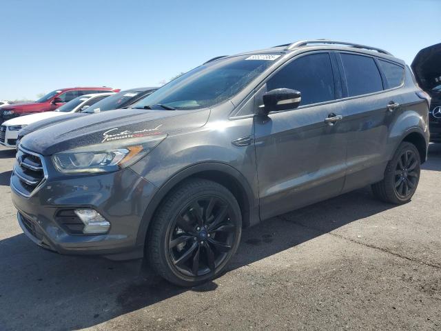 FORD ESCAPE TIT 2017 with VIN 1FMCU9J98HUE57772 - Photo from auction
