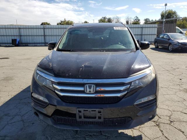 Photo 5 from auction – 2017 HONDA PILOT EXL with VIN 5FNYF6H6XHB000291
