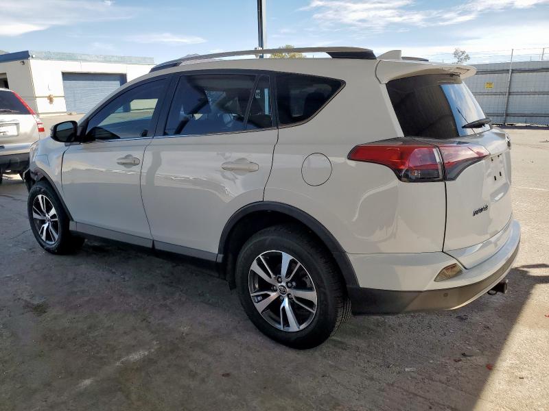 Photo 2 from auction – 2016 TOYOTA RAV4 XLE with VIN JTMWFREV5GD086880