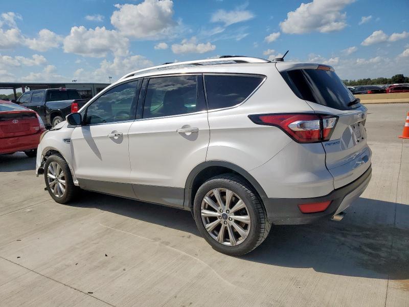 Photo 2 from auction – 2017 FORD ESCAPE TIT with VIN 1FMCU9J91HUD60252