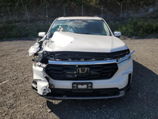 Photo 5 from auction – 2023 HONDA PILOT TOUR with VIN 5FNYG1H7XPB010410