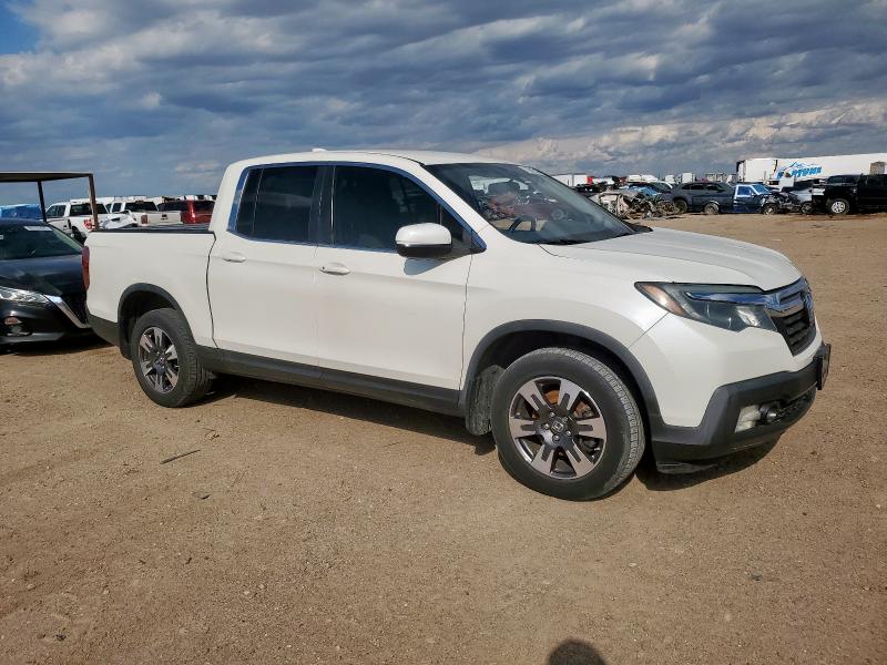 Photo 4 from auction – 2017 HONDA RIDGELINE with VIN 5FPYK3F56HB038290
