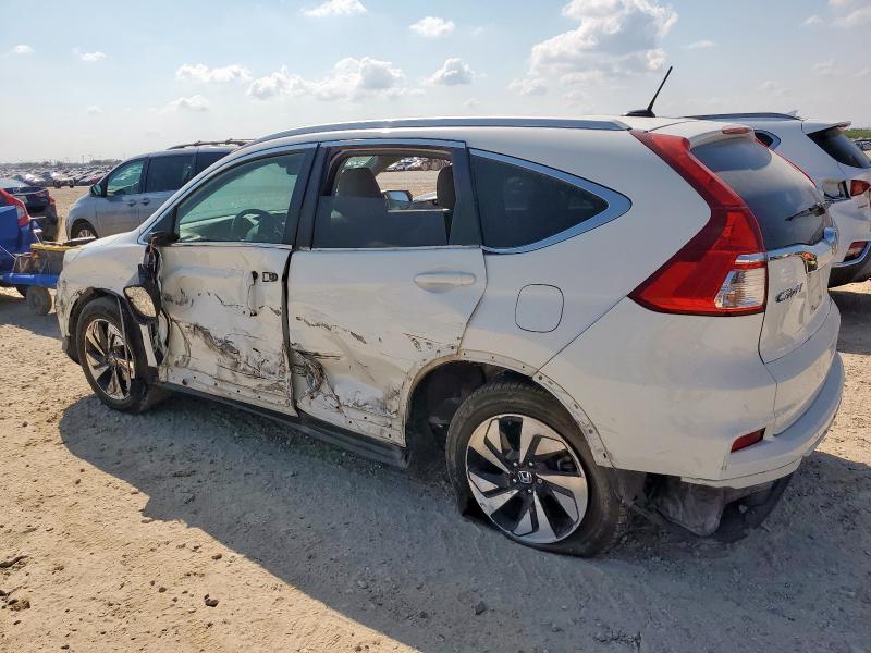 Photo 2 from auction – 2016 HONDA CR-V TOURI with VIN 5J6RM3H94GL029410