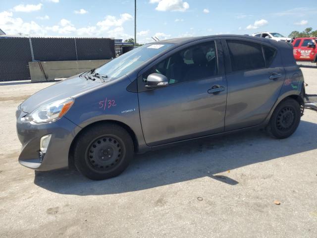 TOYOTA PRIUS C 2015 with VIN JTDKDTB36F1087394 - Photo from auction