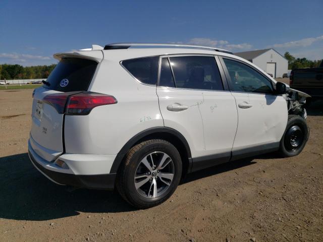 Photo 3 from auction – 2016 TOYOTA RAV4 XLE with VIN JTMRFREV6GJ101269