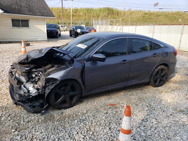 HONDA CIVIC LX 2018 with VIN 2HGFC2F51JH562102 - Photo from auction