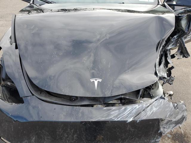 Photo 12 from auction – 2024 TESLA MODEL Y with VIN 7SAYGDEE5RA222221