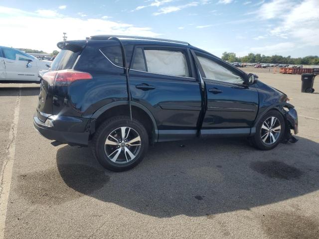 Photo 3 from auction – 2017 TOYOTA RAV4 XLE with VIN JTMRFREV5HD210578
