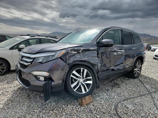 HONDA PILOT ELIT 2017 with VIN 5FNYF6H04HB020693 - Photo from auction