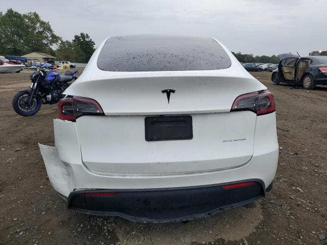 Photo 6 from auction – 2023 TESLA MODEL Y with VIN 7SAYGDEE0PF662251