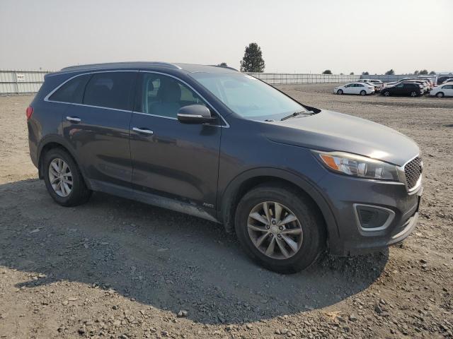 Photo 4 from auction – 2016 KIA SORENTO LX with VIN 5XYPGDA32GG001682