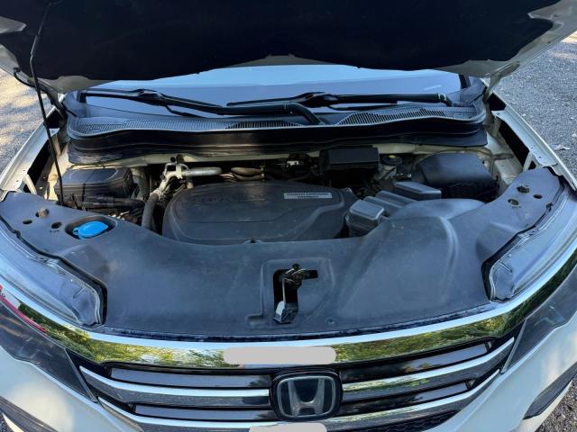 Photo 7 from auction – 2017 HONDA PILOT TOUR with VIN 5FNYF6H92HB005673