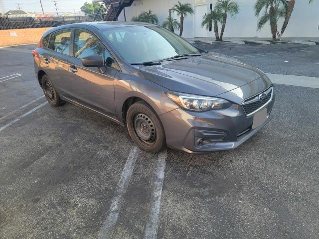 SUBARU IMPREZA 2019 with VIN 4S3GTAA63K3745194 - Photo from auction