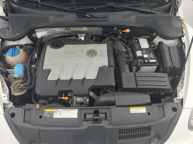 Photo 11 from auction – 2013 VOLKSWAGEN BEETLE with VIN 3VWRL7AT1DM663576