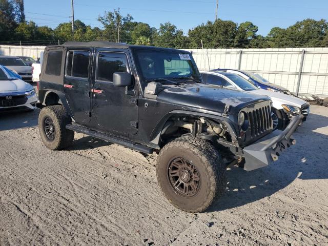 Photo 4 from auction – 2011 JEEP WRANGLER U with VIN 1J4BA3H1XBL506449