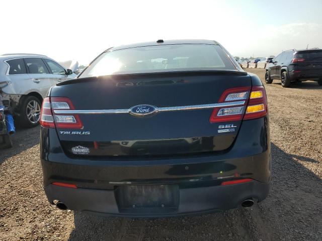 Photo 6 from auction – 2014 FORD TAURUS SEL with VIN 1FAHP2H8XEG129453