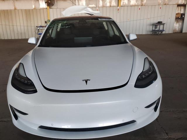 Photo 5 from auction – 2018 TESLA MODEL 3 with VIN 5YJ3E1EA2JF018394