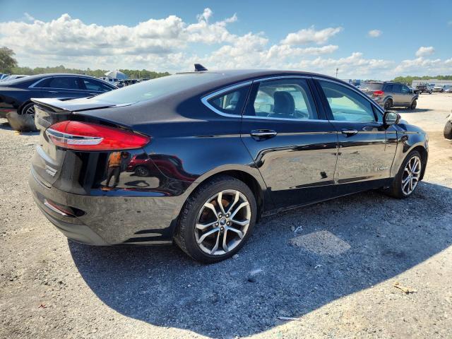Photo 3 from auction – 2019 FORD FUSION TIT with VIN 3FA6P0RU5KR217175