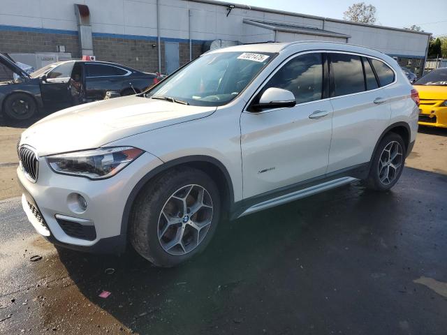 BMW X1 XDRIVE2 2016 with VIN WBXHT3C39GP880878 - Photo from auction