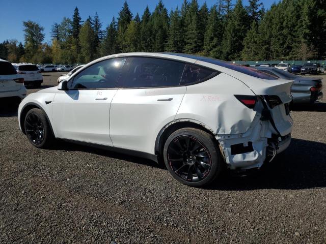 Photo 2 from auction – 2020 TESLA MODEL Y with VIN 5YJYGDEE2LF053475