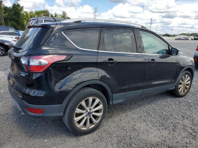 Photo 3 from auction – 2017 FORD ESCAPE TITANIUM with VIN 1FMCU0J96HUE84335