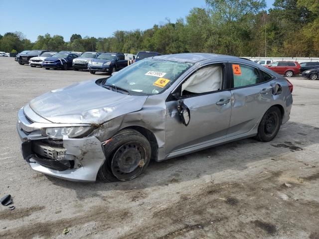HONDA CIVIC LX 2018 with VIN 19XFC2F56JE006247 - Photo from auction