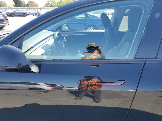 Photo 7 from auction – 2025 TESLA MODEL Y with VIN 7SAYGAEE5SF253850