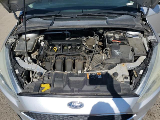 Photo 11 from auction – 2015 FORD FOCUS SE with VIN 1FADP3F29FL370013